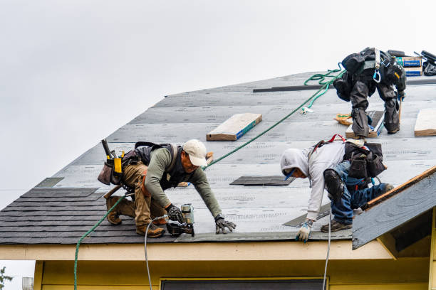 Professional Gutter Installation technician working in Amber, OK